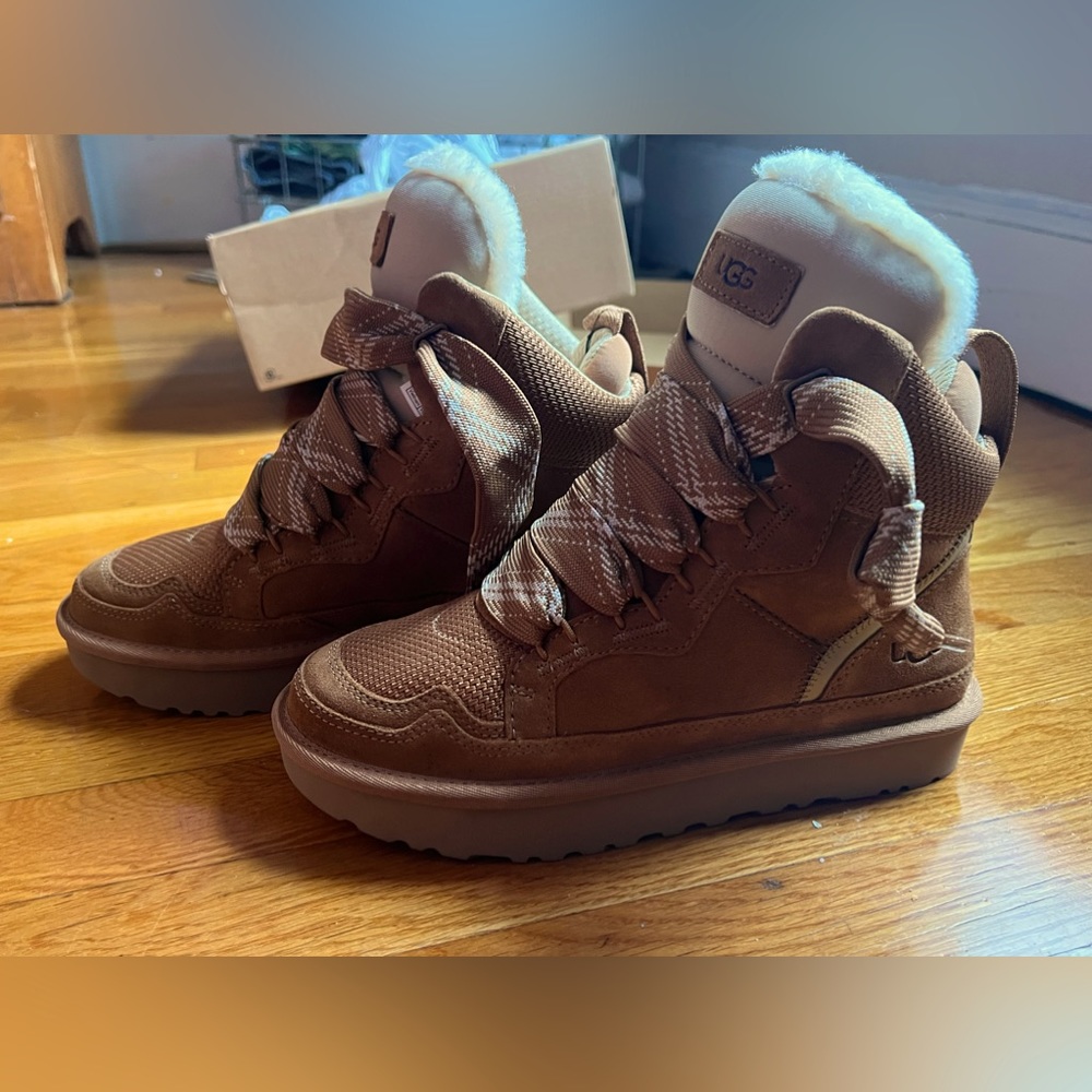 UGGs_ Womens sz 7 NWT. Never worn. Still in box. Winter Boots. Unique Style.